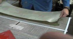 Peel Ply is positioned over the laminated part